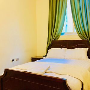 Kamer met een Queen Size Bed